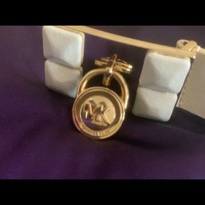 MK Cream belt/buckle accented with a gold MK lock